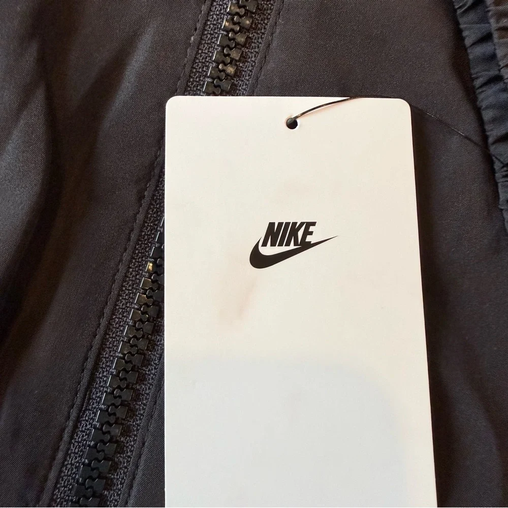NWT Nike black Windrunner jacket size 12 months